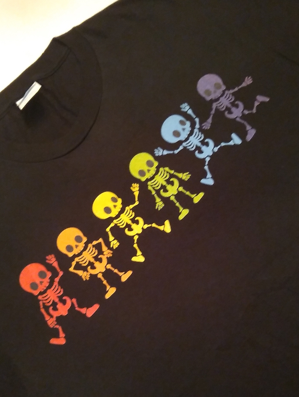 Black Short-Sleeve Tee with Rainbow Dancing Skeletons